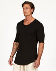Male modeling black v neck shirt