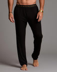 Male modeling the black tree silk pant