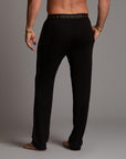 Male modeling the black tree silk pant