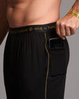 Male modeling the black tree silk pant