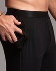 Male modeling the black tree silk pant
