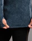 A man modeling a One Golden Thread Waffle Long Sleeve Raglan shirt in blue mineral