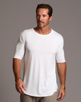 Male modeling white crew neck shirt