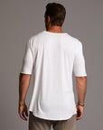 Male modeling white crew neck shirt