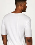 Male modeling white crew neck shirt