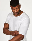 Male modeling white crew neck shirt