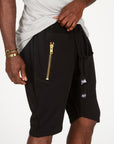 A man modeling black milanos mid shorts