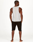 A man modeling black milanos mid shorts