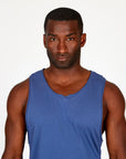 Man modeling an Indigo Dawn blue tank top