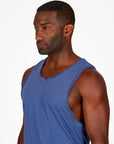 Man modeling an Indigo Dawn blue tank top