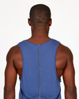 Man modeling an Indigo Dawn blue tank top