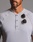 Man modeling a Blue Clay colored Short Sleeve Henley shirt