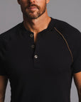 Man modeling a black Short Sleeve Henley shirt