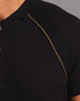 Man modeling a black Short Sleeve Henley shirt