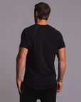 Man modeling a black Short Sleeve Henley shirt
