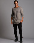 Man modeling a milano pants in black