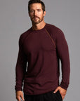 Male modeling red long sleeve raglan