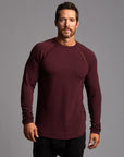 Male modeling red long sleeve raglan
