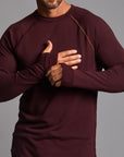 Male modeling red long sleeve raglan