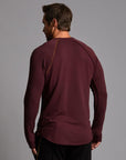 Male modeling red long sleeve raglan