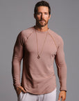 Male modeling terracotta long sleeve raglan