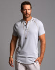 Man modeling a Blue Clay colored Short Sleeve Henley shirt