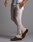 Man modeling a milano pants in white stone