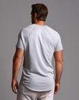 Man modeling a Blue Clay colored Short Sleeve Henley shirt