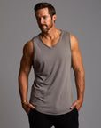 Man modeling a Clay gray tank top