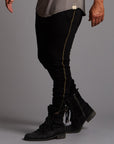 Man modeling a milano pants in black