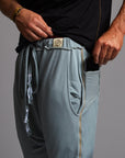Male modeling Agave colored pants