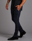 Man modeling the milano pant in charcoal blue