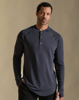 Male modeling blue long sleeve henley