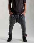 male modeling black pants in grey mineral