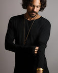 Man modeling a long sleeve crew shirt in black