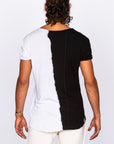Male modeling half white half black crew neck shirt