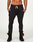 Man modeling a milano pants in charcoal blue