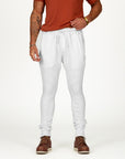 Man modeling the milano pant in pure white