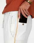 Man modeling the milano pant in pure white