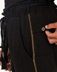 Man modeling the milano pant in black
