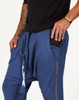 Male modeling Indigo Dawn blue colored pants