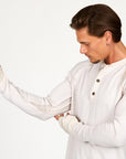 male modeling white long sleeve shirt
