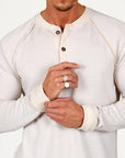 male modeling white long sleeve shirt