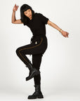 Woman modeling the milano pant in black