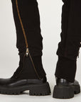 Man modeling the milano pant in black