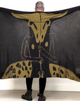 A man wearing the Artist Collab: Carlito Dalceggio x One Golden Thread "Minotaur Nature Wrap"