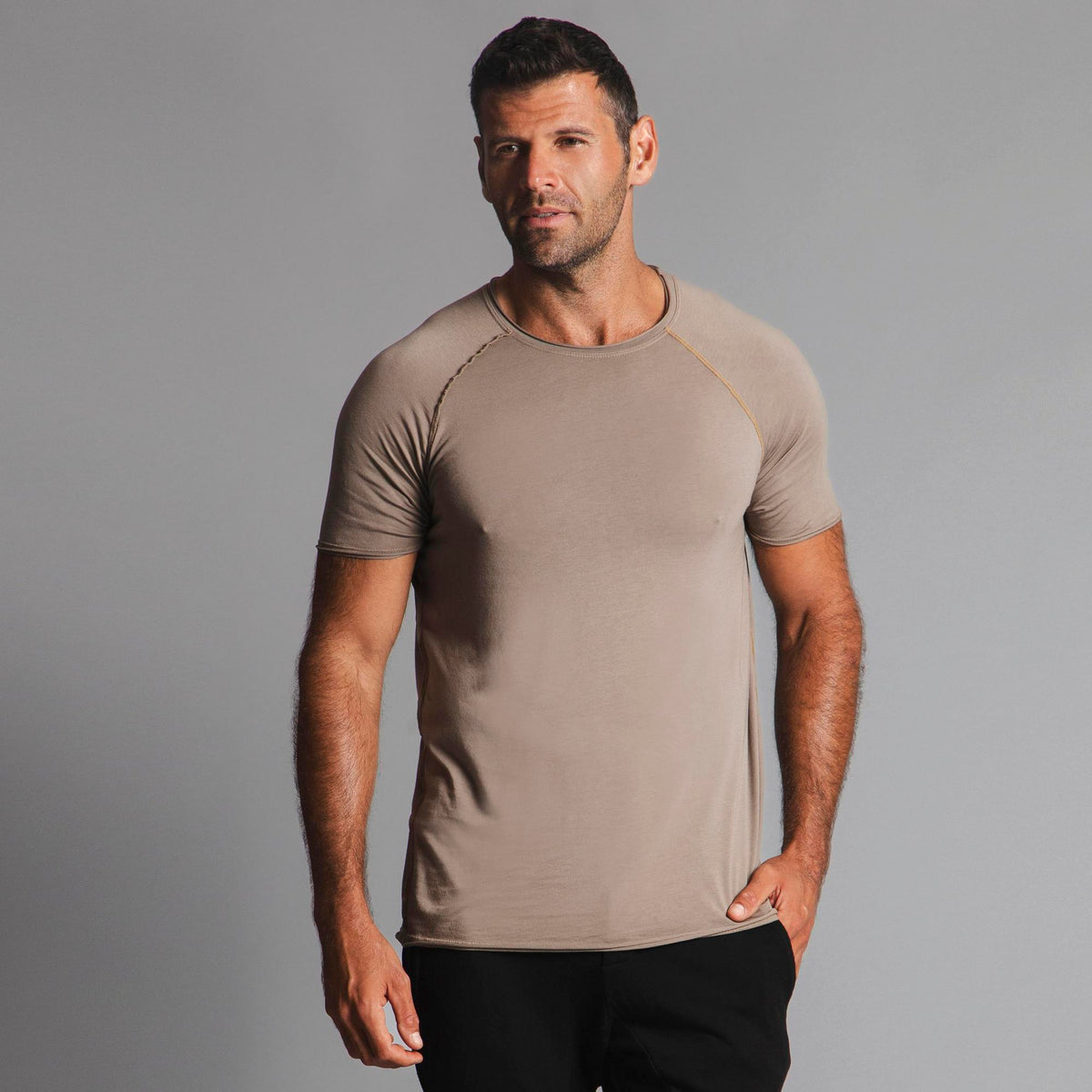 Male modeling tan ultimate tee shirt