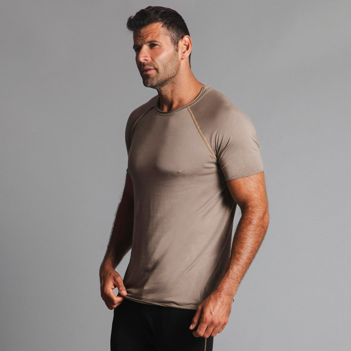 Male modeling tan ultimate tee shirt