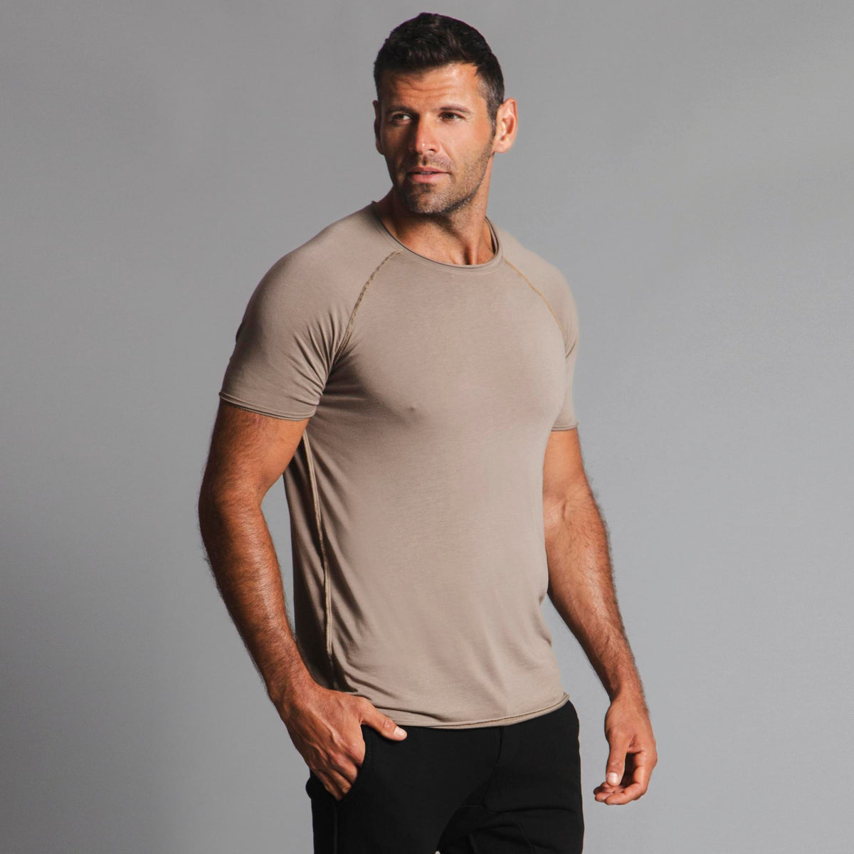 Male modeling tan ultimate tee shirt