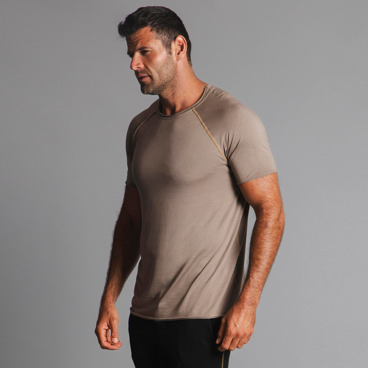 Male modeling tan ultimate tee shirt